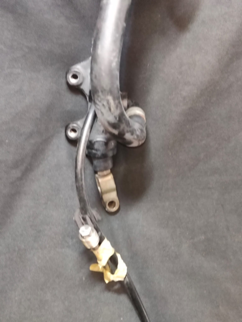 Pinza freno Nissin con staffa - vista frontale